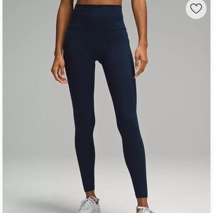 Deep teal Lululemon leggings